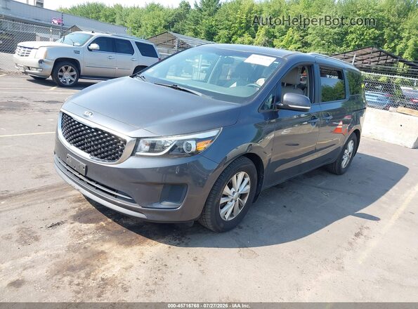 KNDMB5C15G6110787 2016 KIA SEDONA Gray Vista tres cuartos delantera izquierda
