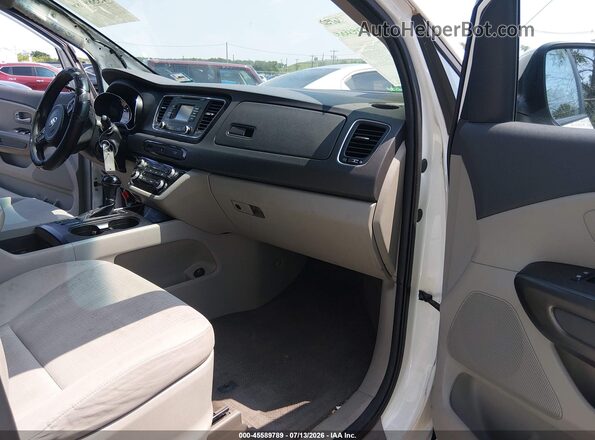KNDMB5C15G6188096 2016 KIA SEDONA White Widok wnętrza z przodu