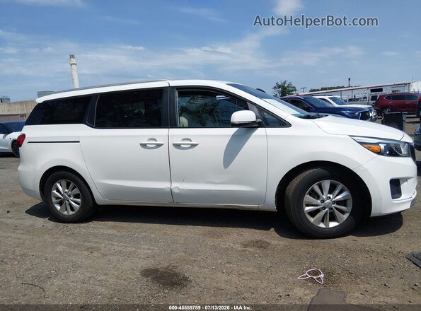 KNDMB5C15G6188096 2016 KIA SEDONA White Widok wnętrza z tyłu