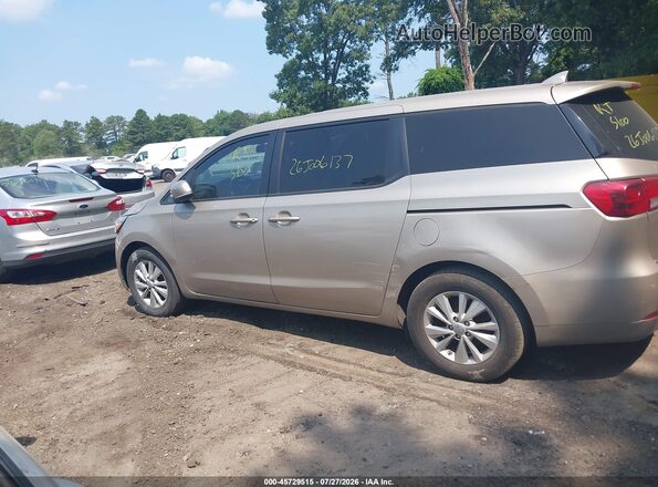 KNDMB5C16H6219289 2017 KIA SEDONA Tan Սալոնի հետևի տեսք