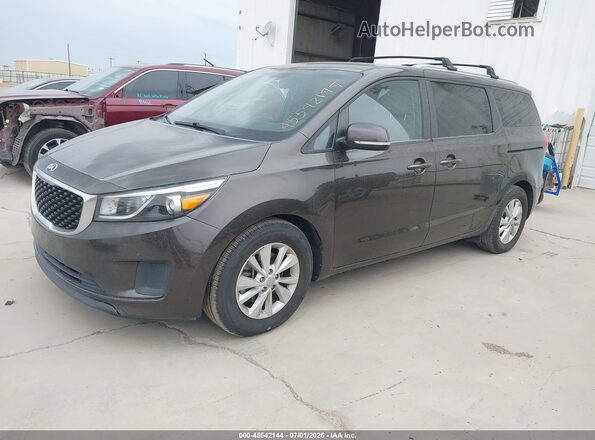 KNDMB5C17G6093751 2016 KIA SEDONA Brown Front left