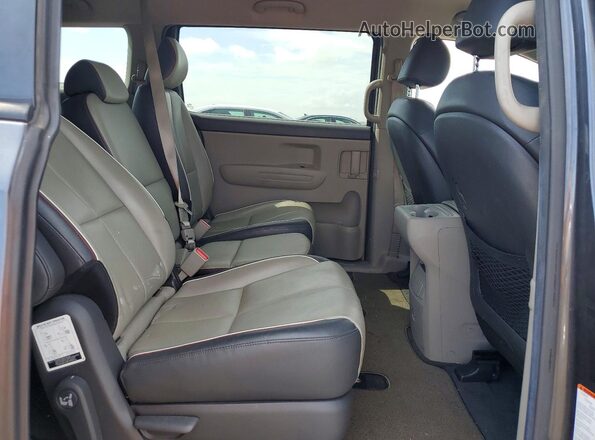 KNDMB5C17G6216352 2016 KIA SEDONA Gray Vista interior trasera