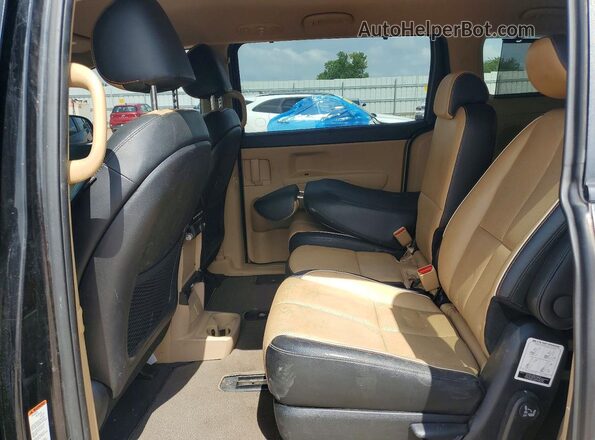 KNDMB5C17J6378621 2018 KIA SEDONA Black Widok wnętrza z tyłu