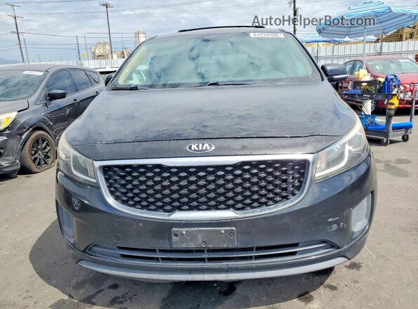 KNDMB5C18G6182258 2016 KIA SEDONA Black Front view