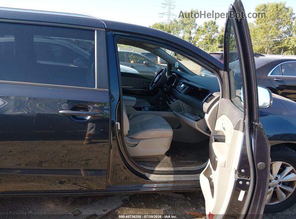 KNDMB5C18G6201777 2016 KIA SEDONA Black Front interior view