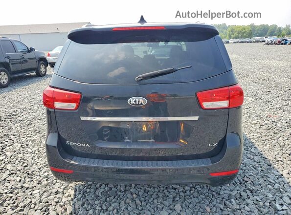 KNDMB5C18J6379129 2018 KIA SEDONA Black უკანა ხედი