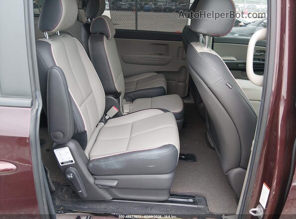 KNDMB5C19J6379978 2018 KIA SEDONA Maroon Rear seats view