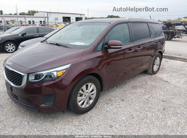 KNDMB5C19J6379978 2018 KIA SEDONA Maroon Front left