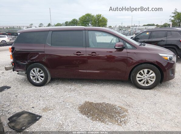 KNDMB5C19J6379978 2018 KIA SEDONA Maroon Rear interior view