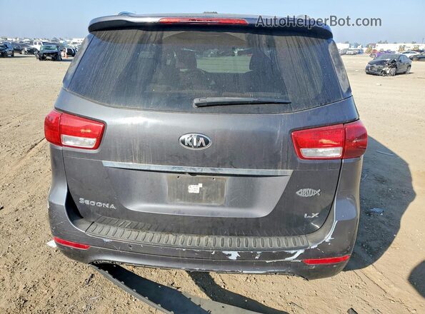 KNDMB5C1XG6090519 2016 KIA SEDONA Gray Widok z tyłu