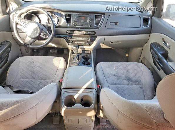 KNDMB5C1XG6090519 2016 KIA SEDONA Gray Widok deski rozdzielczej