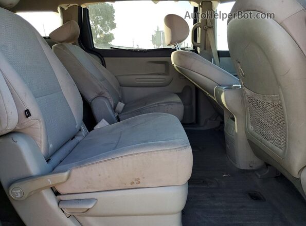 KNDMB5C1XG6090519 2016 KIA SEDONA Gray Widok wnętrza z tyłu