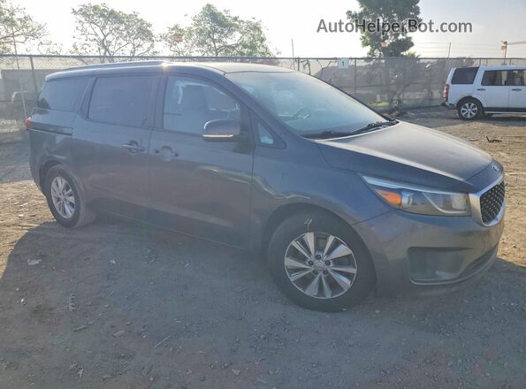 KNDMB5C1XG6090519 2016 KIA SEDONA Gray Przód prawy