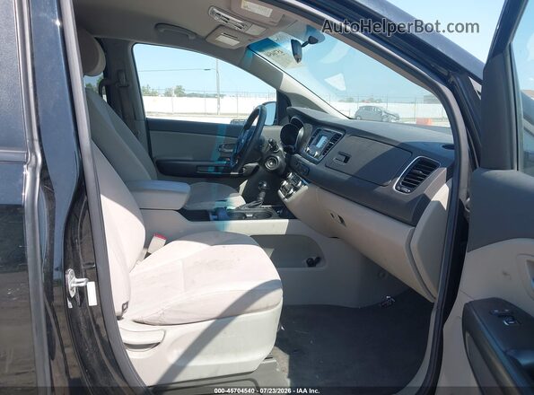 KNDMB5C1XG6163534 2016 KIA SEDONA Black Vista interior delantera