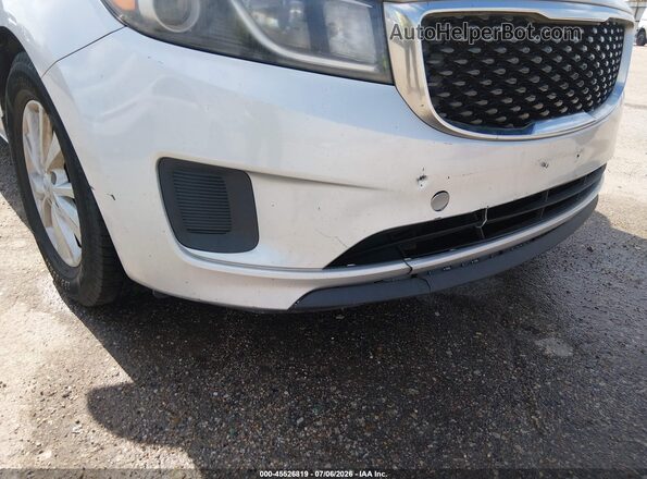 KNDMB5C1XG6196047 2016 KIA SEDONA Silver Front view