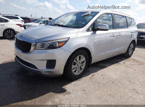 KNDMB5C1XG6196047 2016 KIA SEDONA Silver Front left