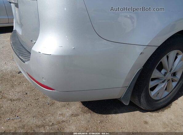 KNDMB5C1XG6196047 2016 KIA SEDONA Silver Rear interior view