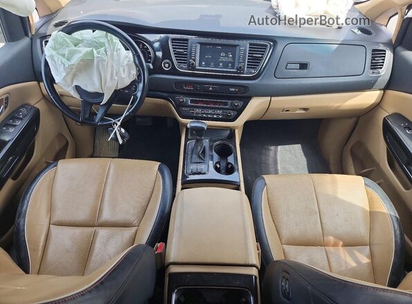 KNDMC5C11H6336632 2017 KIA SEDONA Burgundy Vista del salpicadero