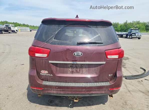 KNDMC5C11H6336632 2017 KIA SEDONA Burgundy Vista trasera