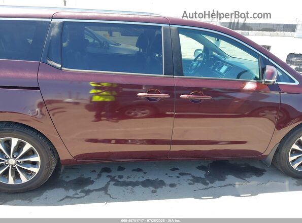 KNDMC5C12G6143548 2016 KIA SEDONA Бордовый Вид задней части салона