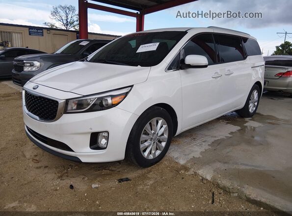 KNDMC5C12H6273234 2017 KIA SEDONA White Front left