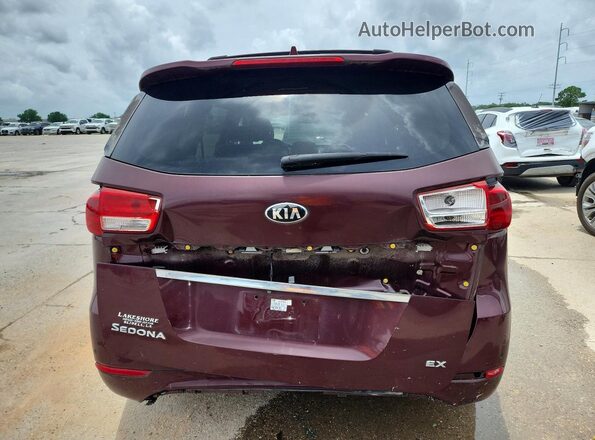 KNDMC5C13G6143879 2016 KIA SEDONA Burgundy Widok z tyłu