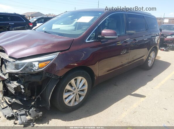 KNDMC5C14H6255656 2017 KIA SEDONA Maroon Передня ліва чверть