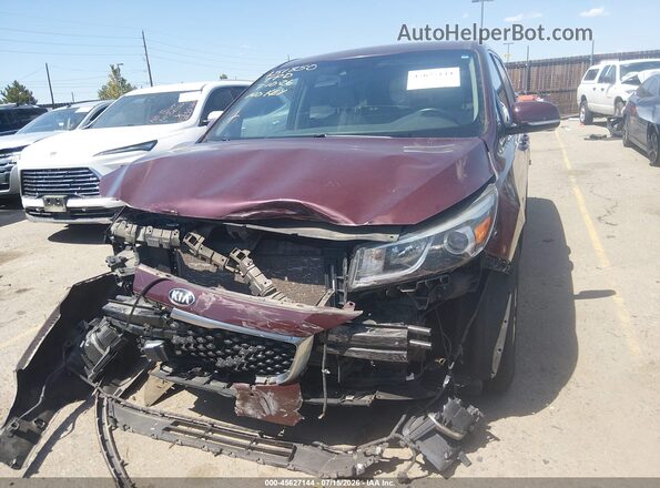 KNDMC5C14H6255656 2017 KIA SEDONA Maroon Вид задньої частини салону