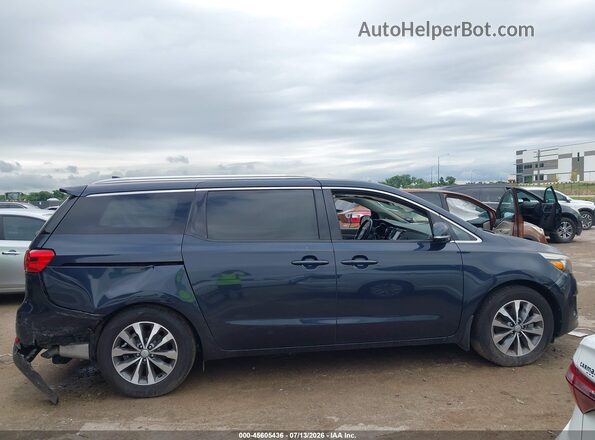 KNDMC5C15G6169724 2016 KIA SEDONA Dark Blue Вид задньої частини салону