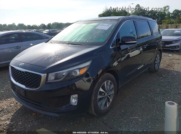 KNDMC5C17G6131377 2016 KIA SEDONA Black Front left