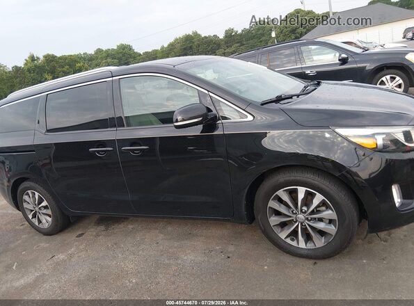 KNDMC5C17G6183155 2016 KIA SEDONA Black Вид задньої частини салону