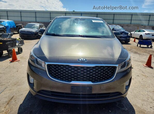KNDMC5C18G6104026 2016 KIA SEDONA Charcoal Front view