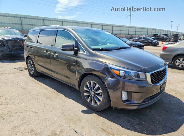 KNDMC5C18G6104026 2016 KIA SEDONA Charcoal Front right