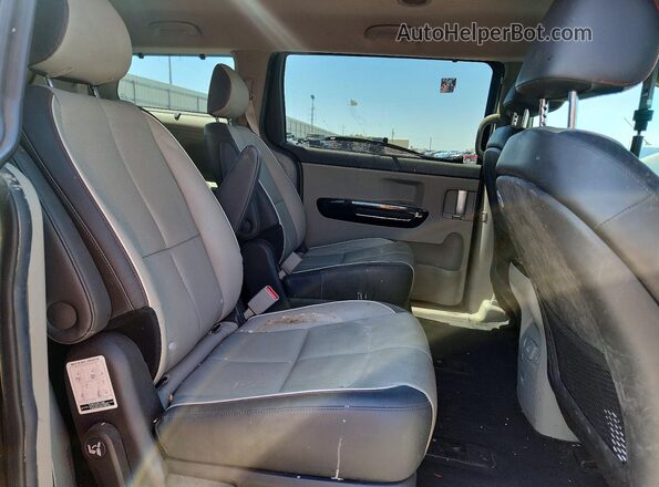 KNDMC5C18G6104026 2016 KIA SEDONA Charcoal Rear interior view