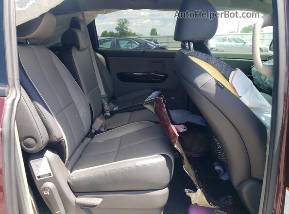 KNDMC5C19H6259329 2017 KIA SEDONA Burgundy Rear interior view