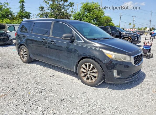 KNDMC5C1XG6145936 2016 KIA SEDONA Черный Передняя правая четверть