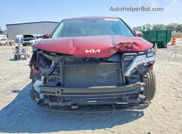 KNDNB4H32N6176381 2022 KIA CARNIVAL Burgundy Front view