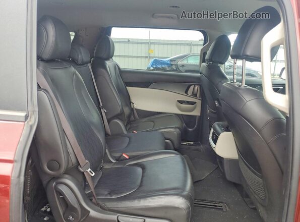 KNDNB4H34N6133483 2022 KIA CARNIVAL Burgundy Vista interior trasera