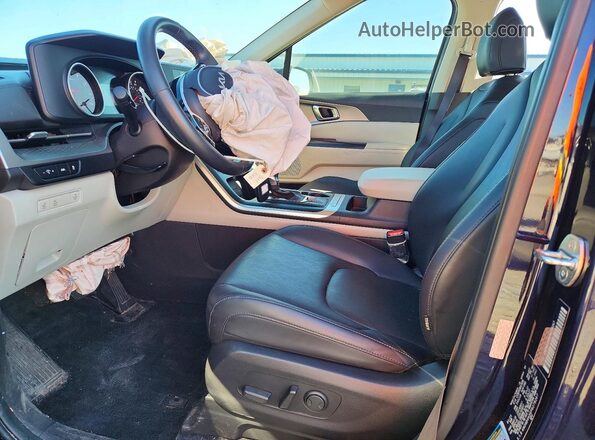 KNDNB4H36P6278267 2023 KIA CARNIVAL Синий Вид салона спереди