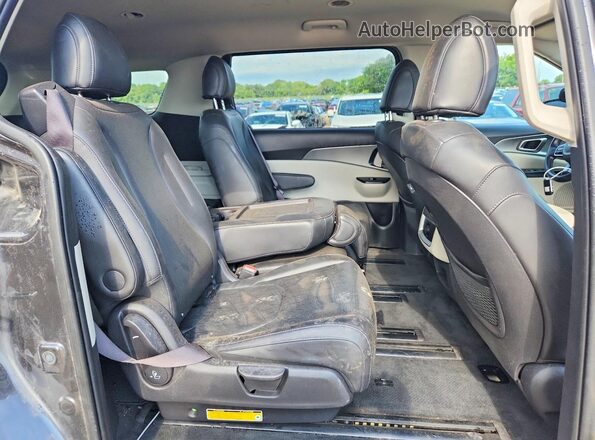 KNDNB4H36P6278964 2023 KIA CARNIVAL Black Вид задньої частини салону