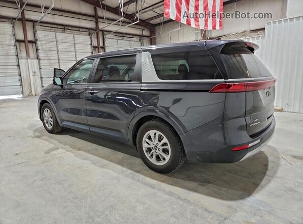 KNDNB4H38P6244976 2023 KIA CARNIVAL Gray Trasero izquierdo