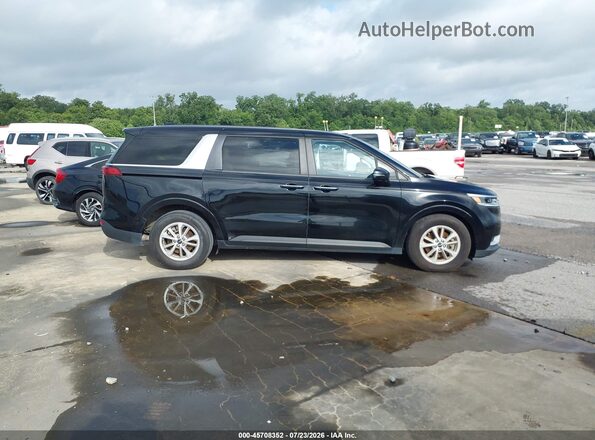 KNDNB4H3XN6156458 2022 KIA CARNIVAL MPV Black Widok wnętrza z tyłu