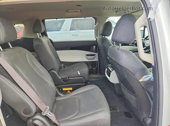KNDNB5H39P6293240 2023 KIA CARNIVAL White Rear interior view