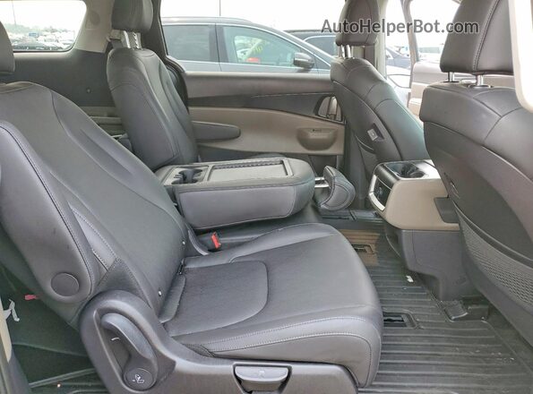 KNDNB5K30T6562289 2026 KIA CARNIVAL Gray Rear interior view