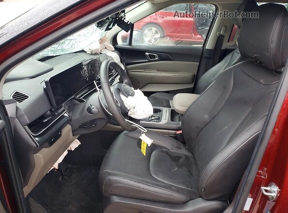 KNDNB5K32T6586674 2026 KIA CARNIVAL Красный Вид салона спереди