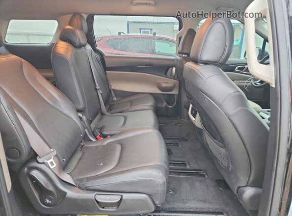 KNDNB5K36S6543910 2025 KIA CARNIVAL Черный Вид задней части салона