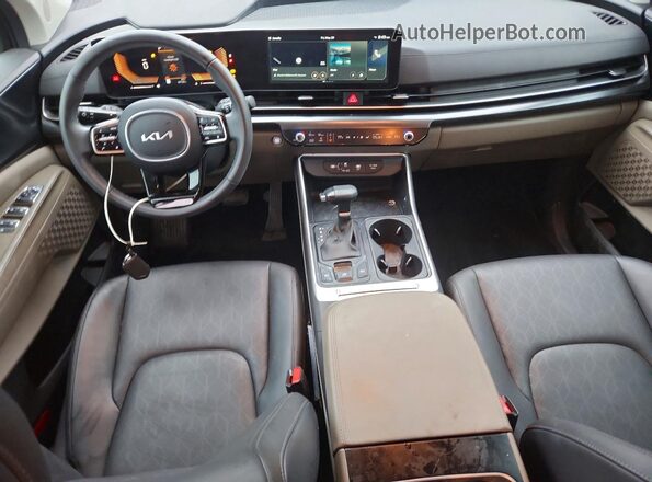 KNDNB5K36S6543910 2025 KIA CARNIVAL Черный Вид панели приборов