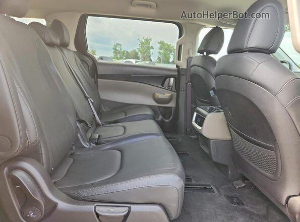 KNDNB5K38T6584654 2026 KIA CARNIVAL Charcoal Вид задньої частини салону