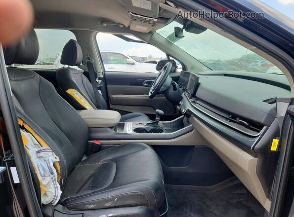 KNDNB5K38T6597629 2026 KIA CARNIVAL Black Widok wnętrza z przodu