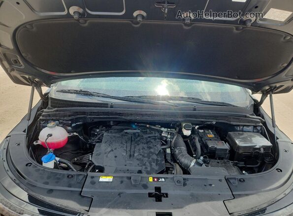 KNDNB5K38T6597629 2026 KIA CARNIVAL Black Widok wnętrza z tyłu